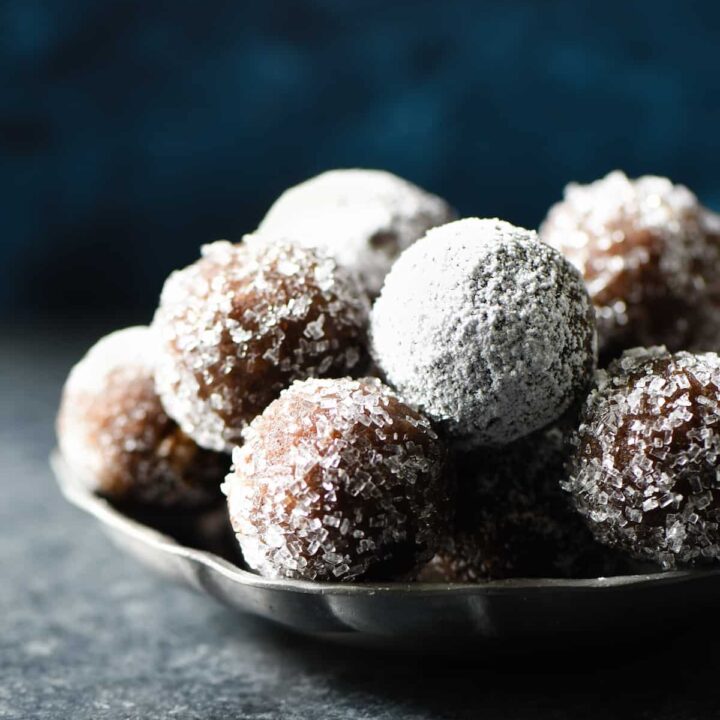 These Almond Flour Rum Balls are a sophisticated alternative to frosting-laden holiday treats, and perfect with a cup of coffee or tea. Naturally gluten free. | foxeslovelemons.com