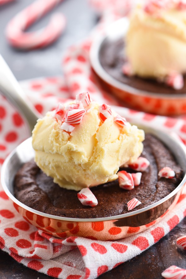 Double Peppermint Brownie Skillets for Two - Peppermint-infused brownies topped with vanilla ice cream and crushed candy cakes. Bake in mini skillets or ramekins for an adorable presentation! | foxeslovelemons.com