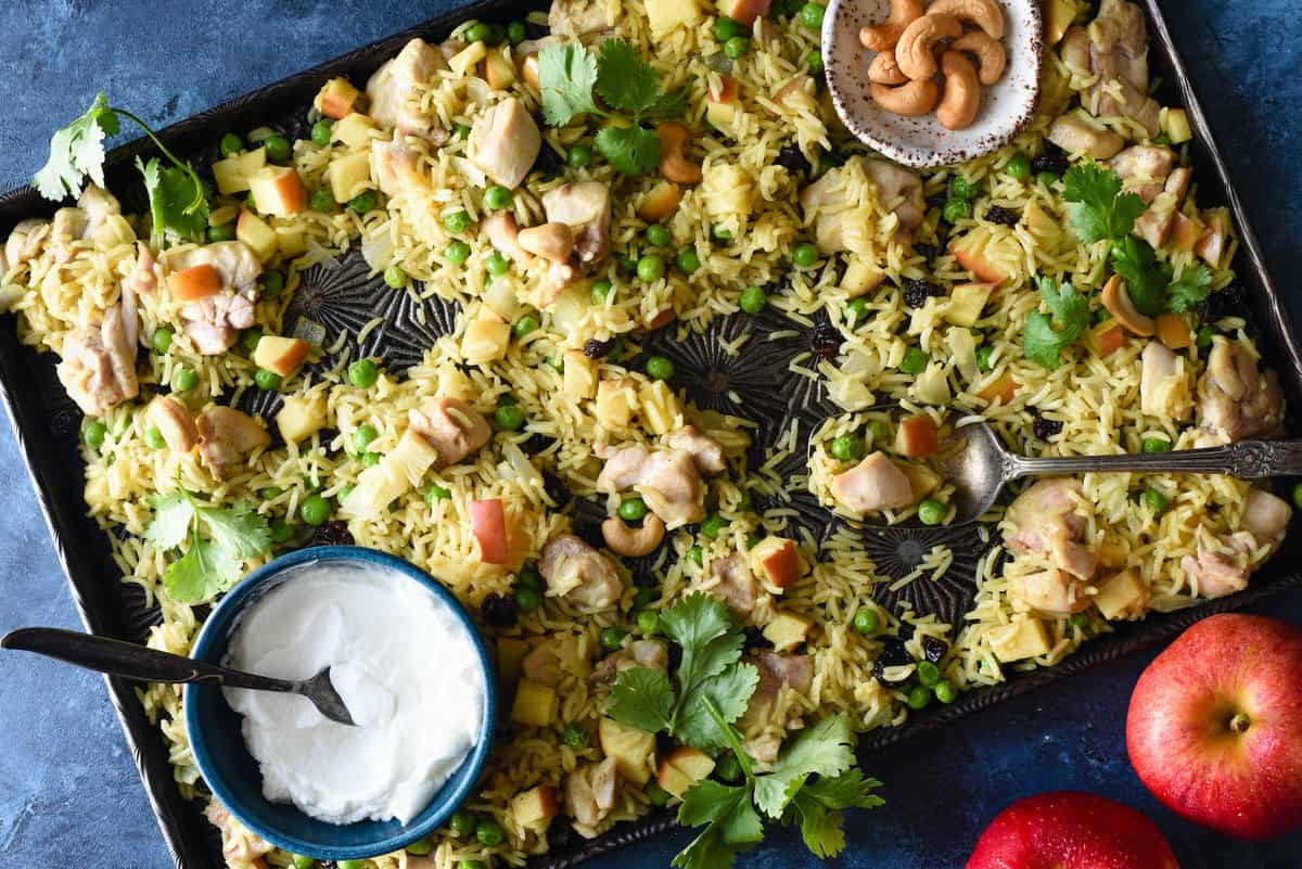 This easy Sheet Pan Chicken & Apple Curry is a complete meal on a pan, and will fill your family up with chicken, rice, fruits and vegetables. Everything goes onto a single baking pan! | foxeslovelemons.com This easy Sheet Pan Chicken & Apple Curry is a complete meal on a pan, and will fill your family up with chicken, rice, fruits and vegetables. Everything goes onto a single baking pan! | foxeslovelemons.com