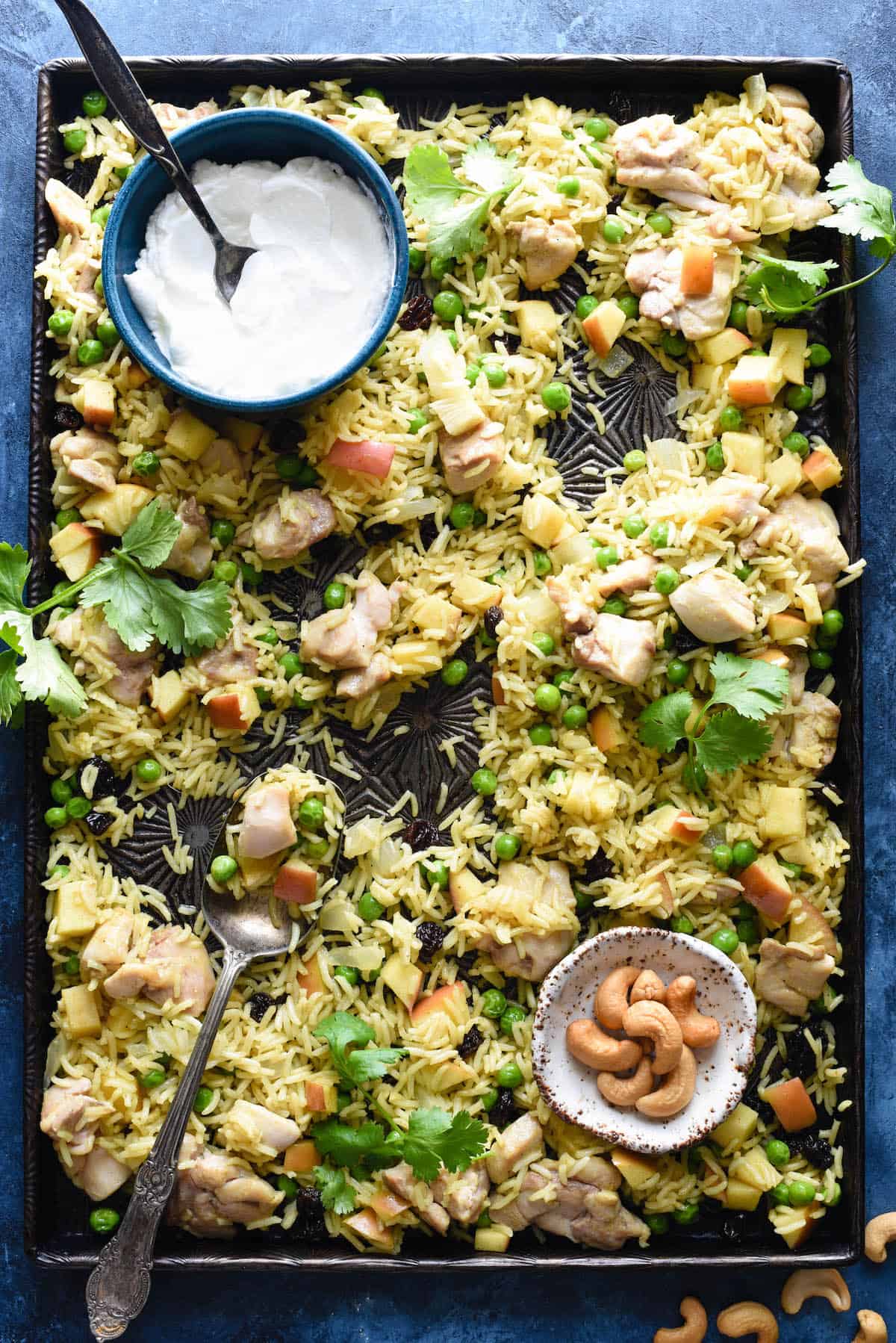 This easy Sheet Pan Chicken & Apple Curry is a complete meal on a pan, and will fill your family up with chicken, rice, fruits and vegetables. Everything goes onto a single baking pan! | foxeslovelemons.com This easy Sheet Pan Chicken & Apple Curry is a complete meal on a pan, and will fill your family up with chicken, rice, fruits and vegetables. Everything goes onto a single baking pan! | foxeslovelemons.com