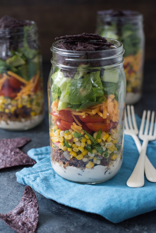 Taco Salad Jars with Green Chile Yogurt Dressing - Classic taco salad, kicked up a notch with a fresh corn salsa + a creamy yogurt dressing. Prep on Sunday, eat for lunches all week! | foxeslovelemons.com