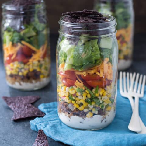 Taco Salad Jars with Green Chile Yogurt Dressing - Classic taco salad, kicked up a notch with a fresh corn salsa + a creamy yogurt dressing. Prep on Sunday, eat for lunches all week! | foxeslovelemons.com