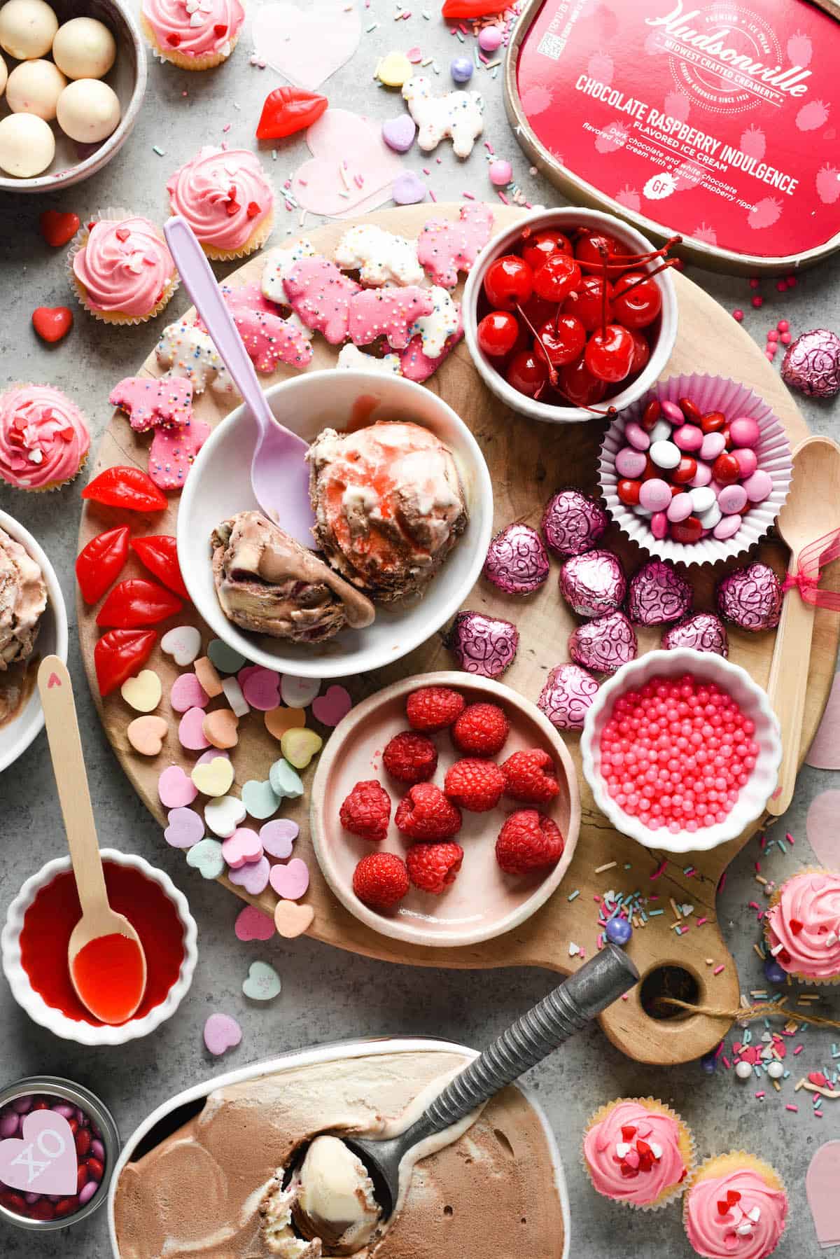Make the holiday extra sweet with this dreamy Valentine's Day Dessert Board featuring ice cream, fruit, candies, chocolate and sprinkles! | foxeslovelemons.com Make the holiday extra sweet with this dreamy Valentine's Day Dessert Board featuring ice cream, fruit, candies, chocolate and sprinkles! | foxeslovelemons.com