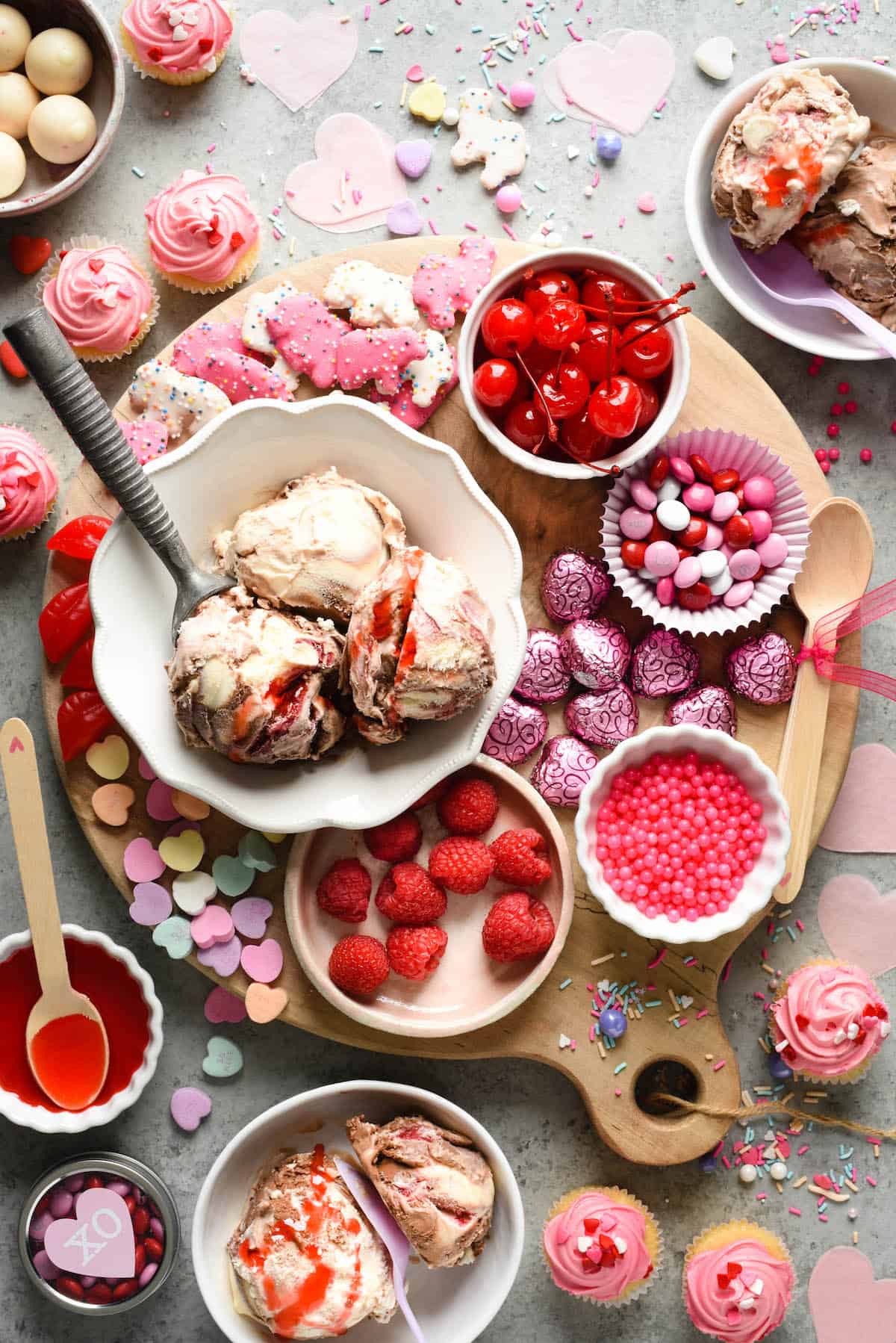 Make the holiday extra sweet with this dreamy Valentine's Day Dessert Board featuring ice cream, fruit, candies, chocolate and sprinkles! | foxeslovelemons.com Make the holiday extra sweet with this dreamy Valentine's Day Dessert Board featuring ice cream, fruit, candies, chocolate and sprinkles! | foxeslovelemons.com